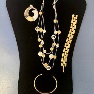 Costume jewelry in gold and silver tones